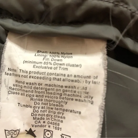 MEC pink puffer down vest.  Zip up. Zipper pockets.  Stuff sac inner pocket. EUC - Picture 4 of 8